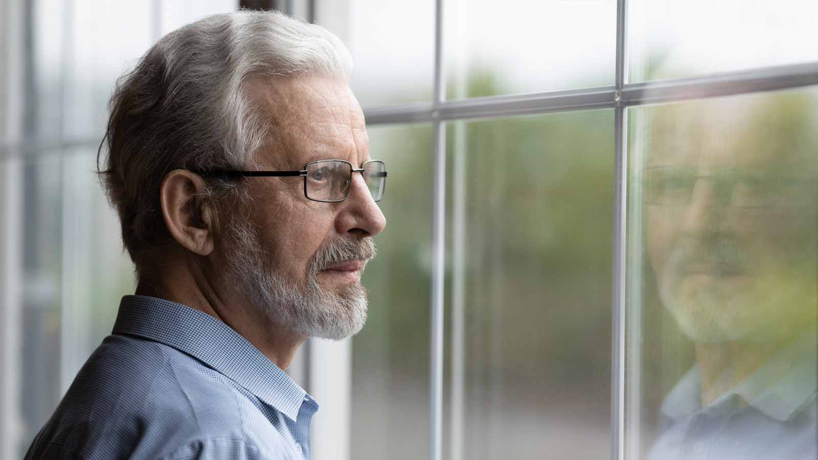 Reflection moment looking in window